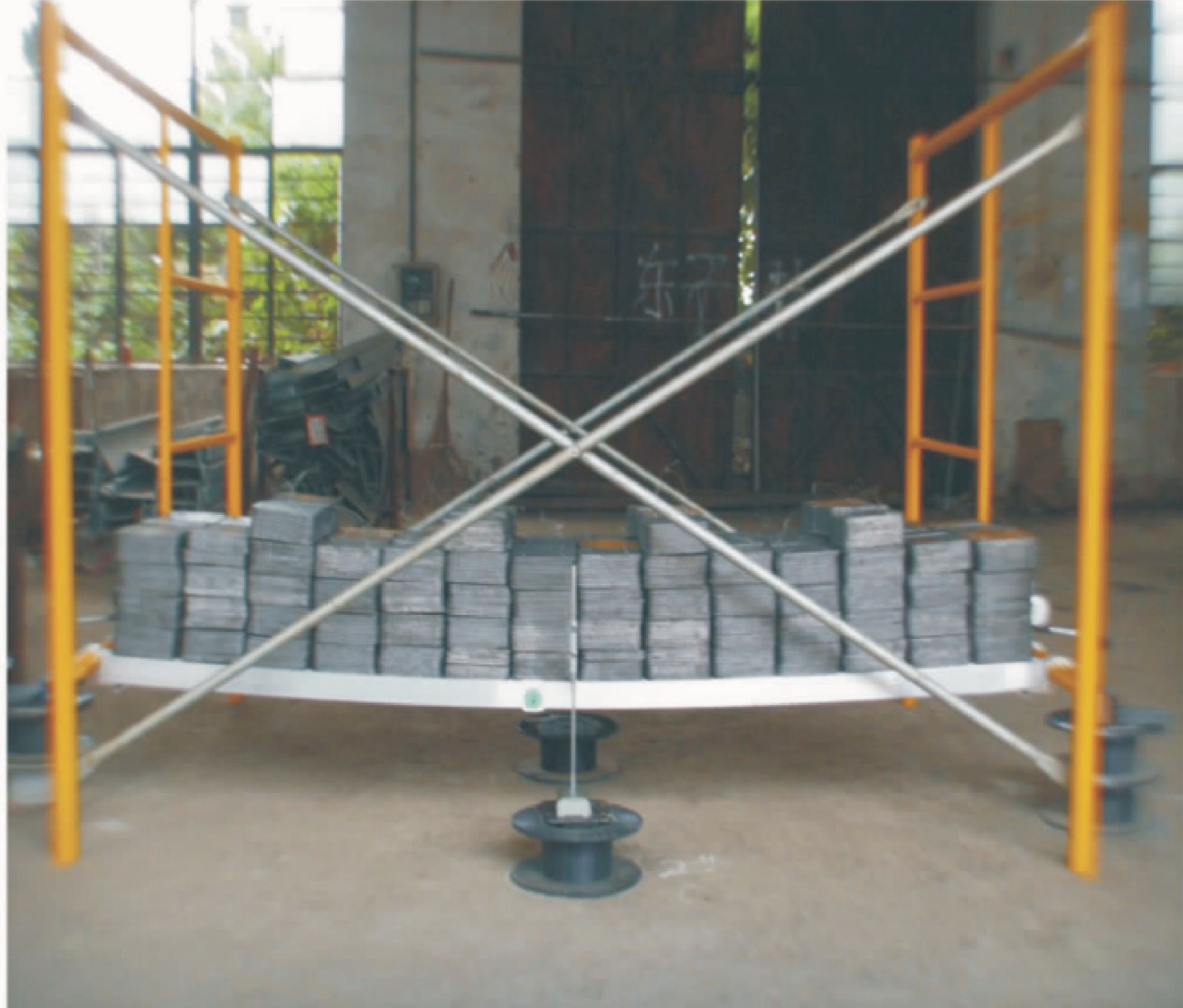 Load test of a 7′ × 19 1/4″ all aluminum plank, photograph from the company catalogue